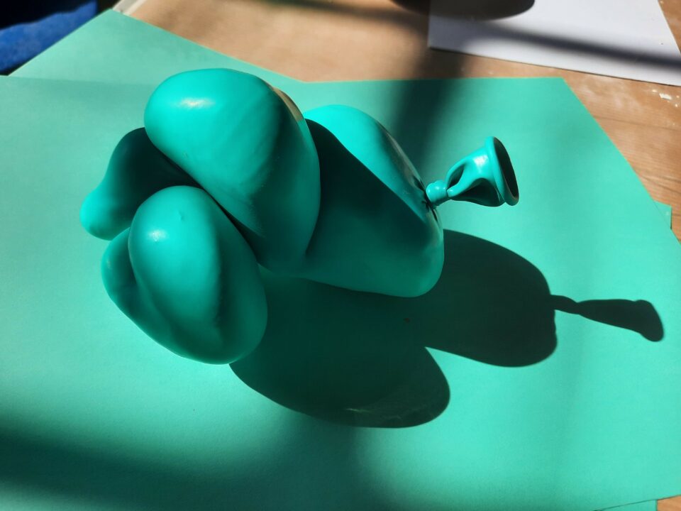 A twisted teal balloon