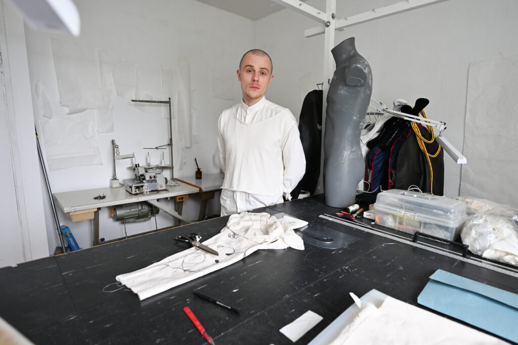 Artist Henry in his fashion studio