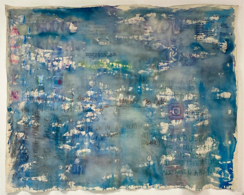 A blue abstract work. Text is visible.