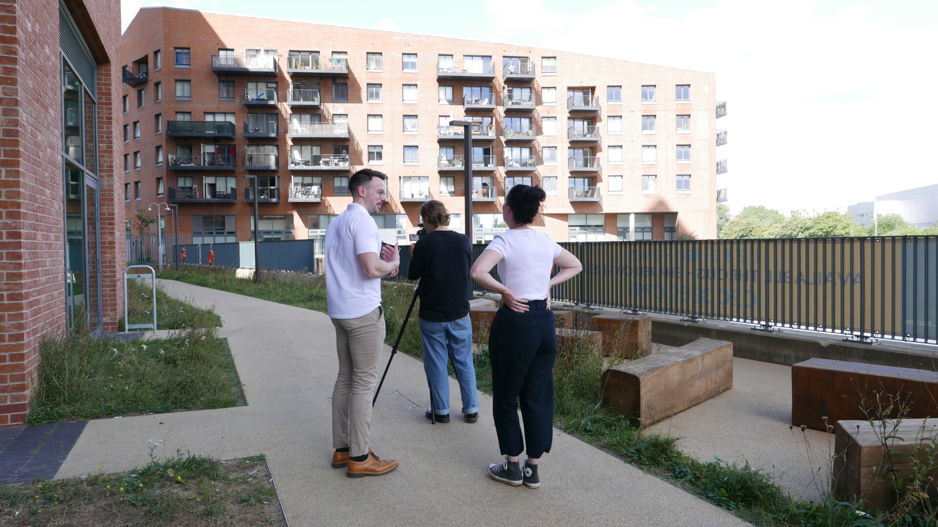 People standing outside of Three Waters