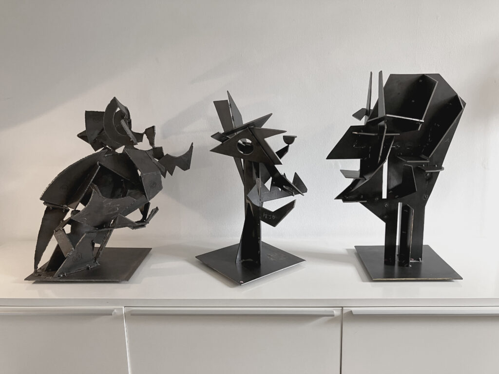 three angular sculptures